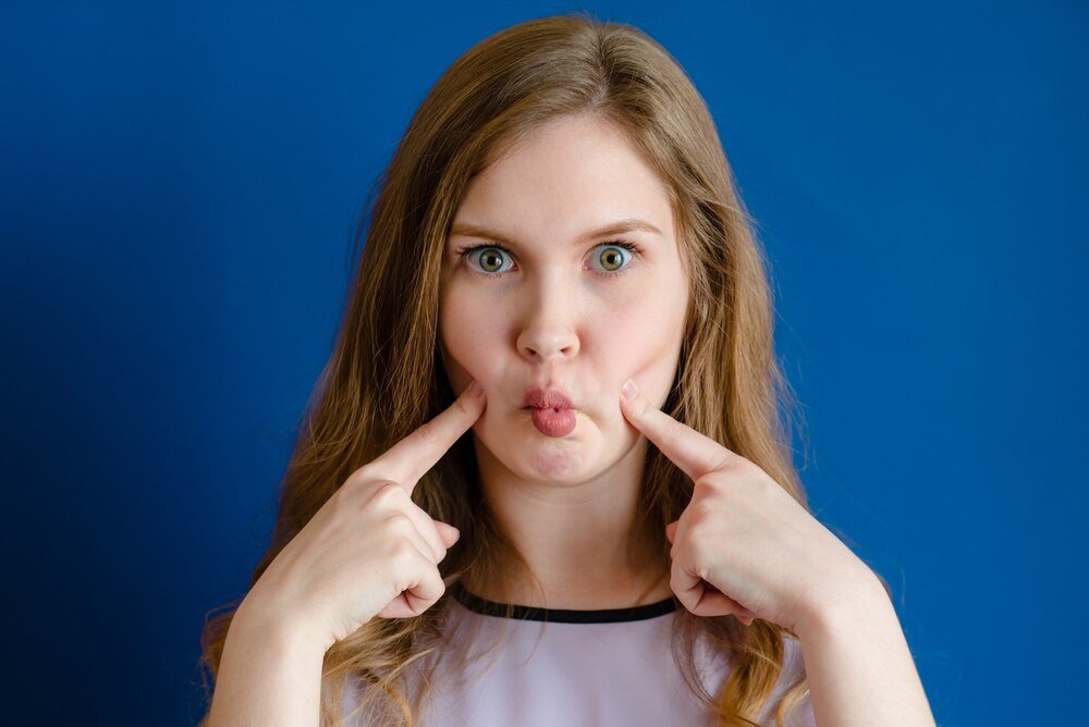 Przyczyny i leczenie przygryzania policzków od wewnątrz